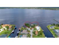 Aerial view of waterfront property at 3058 Mauck Ter, Port Charlotte, FL 33981