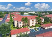 Luxury condo community with lake and lush landscaping at 150 L Pavia Blvd # 14, Venice, FL 34292