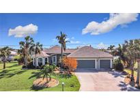 Single-Gathering home with 3-car garage at 18138 Avonsdale Cir, Port Charlotte, FL 33948