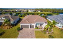 Single-Gathering home with a large driveway at 15048 Spanish Point Dr, Port Charlotte, FL 33981