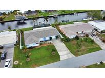 Aerial view of two canal-front homes at 189 Carlisle Nw Ave, Port Charlotte, FL 33952