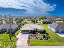Bird's eye view of a house in a residential neighborhood at 289 White Marsh Ln, Rotonda West, FL 33947