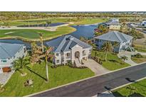 Luxury home with golf course and water views in exclusive community at 10030 Eagle Preserve Dr, Englewood, FL 34224