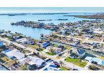 Beautiful waterfront home with boat dock and stunning water views in a tranquil neighborhood at 1960 Mississippi Ave, Englewood, FL 34224