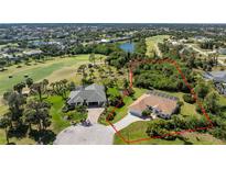 Expansive aerial view of lush real estate lots, golf course and neighborhood, perfect for custom home with golf access at 48 Par View Ct, Rotonda West, FL 33947