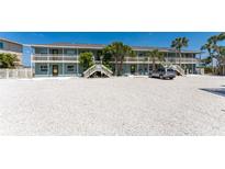 Coastal condo complex features multiple units and ample parking space at 5041 N Beach Rd # 3A And 3B, Englewood, FL 34223