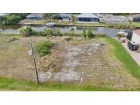 Vacant lot with canal access, ready for building your dream waterfront home at 15342 Aron, Port Charlotte, FL 33981