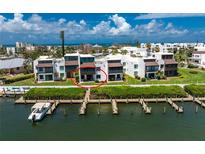 Waterfront condo features a private patio overlooking the channel, offering scenic views and convenient boat access at 2955 N Beach Rd # D113, Englewood, FL 34223
