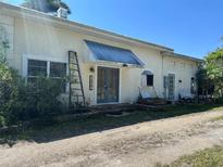 Charming exterior view of home showcasing architectural details at 1916 Myrtle Ave, Punta Gorda, FL 33950
