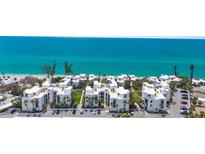 Beautiful beachfront condos featuring meticulously manicured landscaping and private parking at 2950 N Beach Rd # B324, Englewood, FL 34223