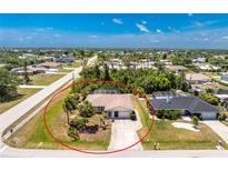Sprawling single-Gathering home with a screened-in pool and a well-maintained yard at 7247 Brookhaven Ter, Englewood, FL 34224