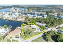 Waterfront property with canal access, beautiful homes and verdant landscaping enhance the property appeal at 3427 Minnow Creek Dr, Hernando Beach, FL 34607