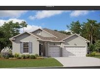 Charming single-story home featuring a two-car garage, landscaped front yard, and neutral exterior paint at 14350 Crisp Apple Ln, Land O Lakes, FL 34638