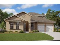 Charming single-story home featuring a two-car garage, well-manicured lawn, and neutral-toned stucco exterior at 17350 Crisp Apple Ln, Land O Lakes, FL 34638