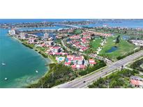 Waterfront condo boasts a stunning aerial view of the community, bay, golf course, and Intracoastal waterway at 6365 Bahia Del Mar Blvd # 210, St Petersburg, FL 33715