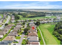 Aerial view showing home's location in golf course community at 10328 Buncombe Way, San Antonio, FL 33576