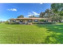 Ranch style home with mature landscaping at 4603 Cannon Harrison Dr, Plant City, FL 33565