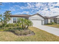Charming single-story home with a two-car garage and well-manicured landscaping in a sunny neighborhood at 3510 N Maryland Ave, Plant City, FL 33565