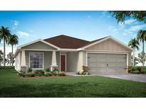 Charming single-story home featuring a well-manicured lawn and attached two car garage at 2638 58Th E Cir, Palmetto, FL 34221
