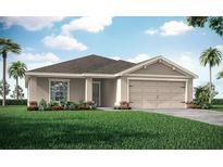 Charming single-story home with manicured lawn and a two-car garage and neutral color palette at 2556 58Th E Cir, Palmetto, FL 34221