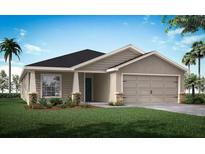 Charming single-story home featuring a symmetrical front facade, well-maintained lawn, and a neutral color palette at 35502 Coventry Fields Loop, Zephyrhills, FL 33541