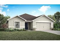 Charming single-story home featuring a manicured lawn and attached two-car garage at 6930 161St E Ter, Parrish, FL 34219