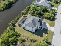 House with pool and canal view, great outdoor space at 14462 Fort Worth Cir, Port Charlotte, FL 33981