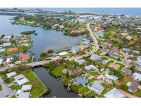 Property located on the water, near other homes and waterways at 612 Albee W Rd, Nokomis, FL 34275
