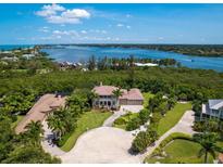 Luxury waterfront home with expansive grounds at 1040 Gulf Winds Way, Nokomis, FL 34275