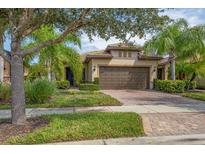 Two-story house with a two car garage at 19185 Mangieri St, Venice, FL 34293
