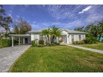 Charming single story home with landscaped lawn at 1 Curacao Cir # 44, Englewood, FL 34223