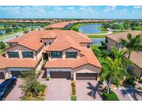 Luxury two-story townhome with lake view at 10780 Tarflower Dr # 102, Venice, FL 34293