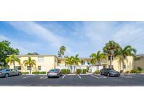 Two-story building with parking lot in front at 700 W Venice Ave # 107, Venice, FL 34285