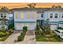 Modern two-story townhome with two-car garage at 4008 Via Sienna Cir, Sarasota, FL 34243