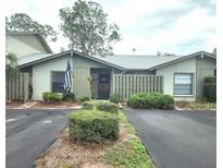 Inviting exterior of a single-story home with a landscaped yard and private driveway at 145 Jose Gaspar Dr # 145, Englewood, FL 34223