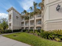 Building exterior showcasing architectural details and landscaping at 500 San Lino Cir # 521, Venice, FL 34292