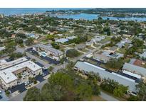 Aerial view of a residential community with waterfront property at 533 Parkdale Mews # 533, Venice, FL 34285