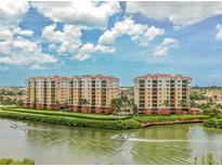 Beautiful waterfront condo community with lush landscaping and boat access at 157 Tampa E Ave # 807, Venice, FL 34285