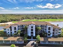 Luxury condo building with golf course and lake views at 17118 Vardon Ter # 202, Bradenton, FL 34211