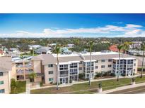 Aerial view of condo building, showcasing its location and surrounding area at 200 The Esplanade N # A7, Venice, FL 34285