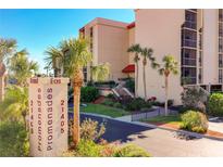 Building exterior with palm trees and parking at 21405 Olean Blvd # 404, Port Charlotte, FL 33952