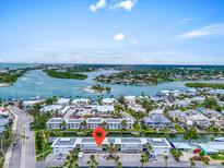Aerial view of waterfront property close to amenities and with stunning views of the water at 902 Gibbs Rd # 181, Venice, FL 34285