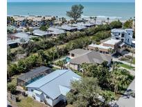 Beautiful coastal community home near ocean with a lush yard and private pool in a desirable neighborhood at 388 Flamingo Dr, Venice, FL 34285