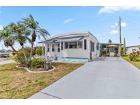 Charming single-story home with a well-maintained front yard and a spacious driveway at 508 Blackburn Blvd, North Port, FL 34287