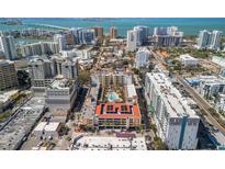 Stunning aerial view of the building showcasing beautiful city and water views at 100 Central Ave # C619, Sarasota, FL 34236