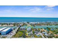 Coastal property boasts stunning ocean views, easy beach access, and a vibrant community feel at 109 Bayshore Rd # 10, Nokomis, FL 34275