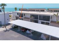 Charming condo complex with covered parking featuring direct beach access and beautiful ocean views at 500 Park S Blvd # 62, Venice, FL 34285