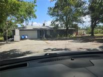 Charming single-story home with a two-car garage and a spacious front yard at 751 Arabian Cir, Nokomis, FL 34275