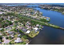 Desirable waterfront neighborhood with homes along canals leading to a bay and easy access to waterfront activities at 214 Pompano Ln, Nokomis, FL 34275