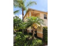 Charming two-story home with tropical landscaping and a private balcony, perfect for enjoying the Florida weather at 4213 Vicenza Dr # A2, Venice, FL 34293